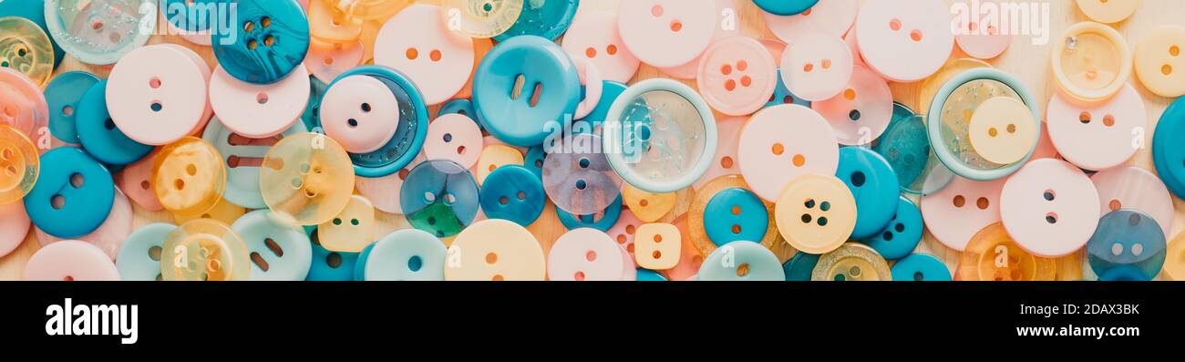 Multi-colored Plastic Buttons. Long Banner Stock Photo