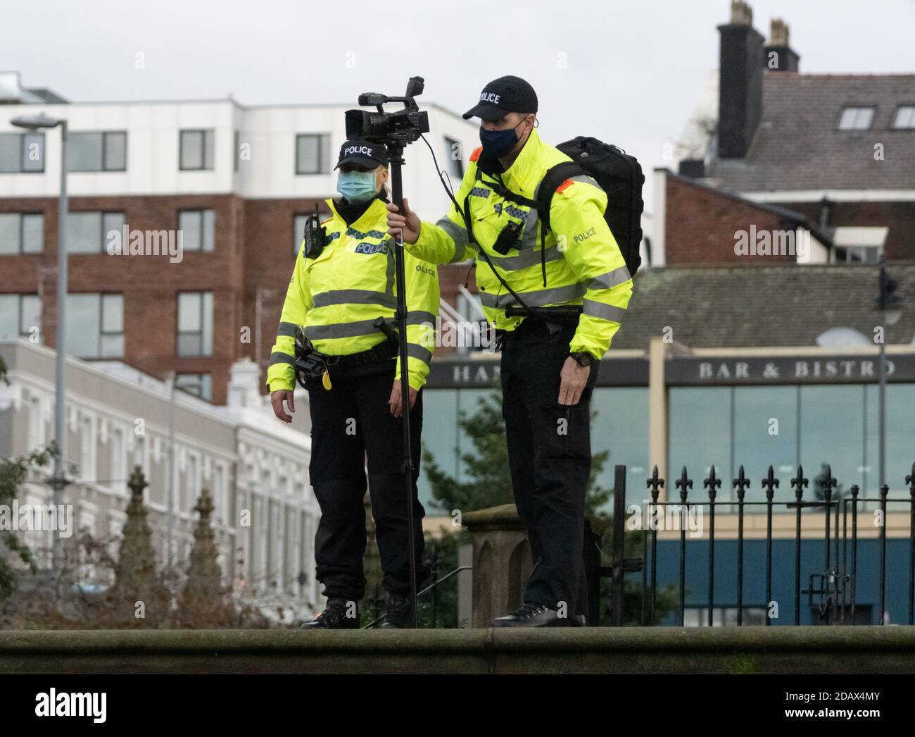 Berry Street, Liverpool, 14th Nov 2020. Two police officers (evidence gatherers) operating a camera on the steps of St Luke's Bombed Out Church Stock Photo