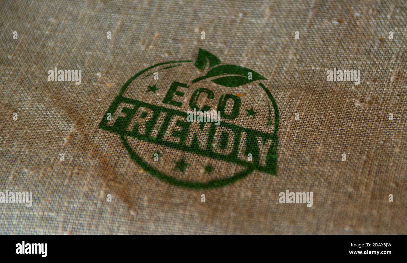 Eco friendly stamp printed on linen sack. Sustainable economy, green, environment, ecology, organic, healthy food and natural life style concept. Stock Photo