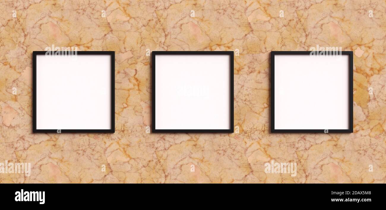 Empty picture frames gallery with square shapes on a marble wall with black frame. Blank Mockup for three images or photos. Stock Photo