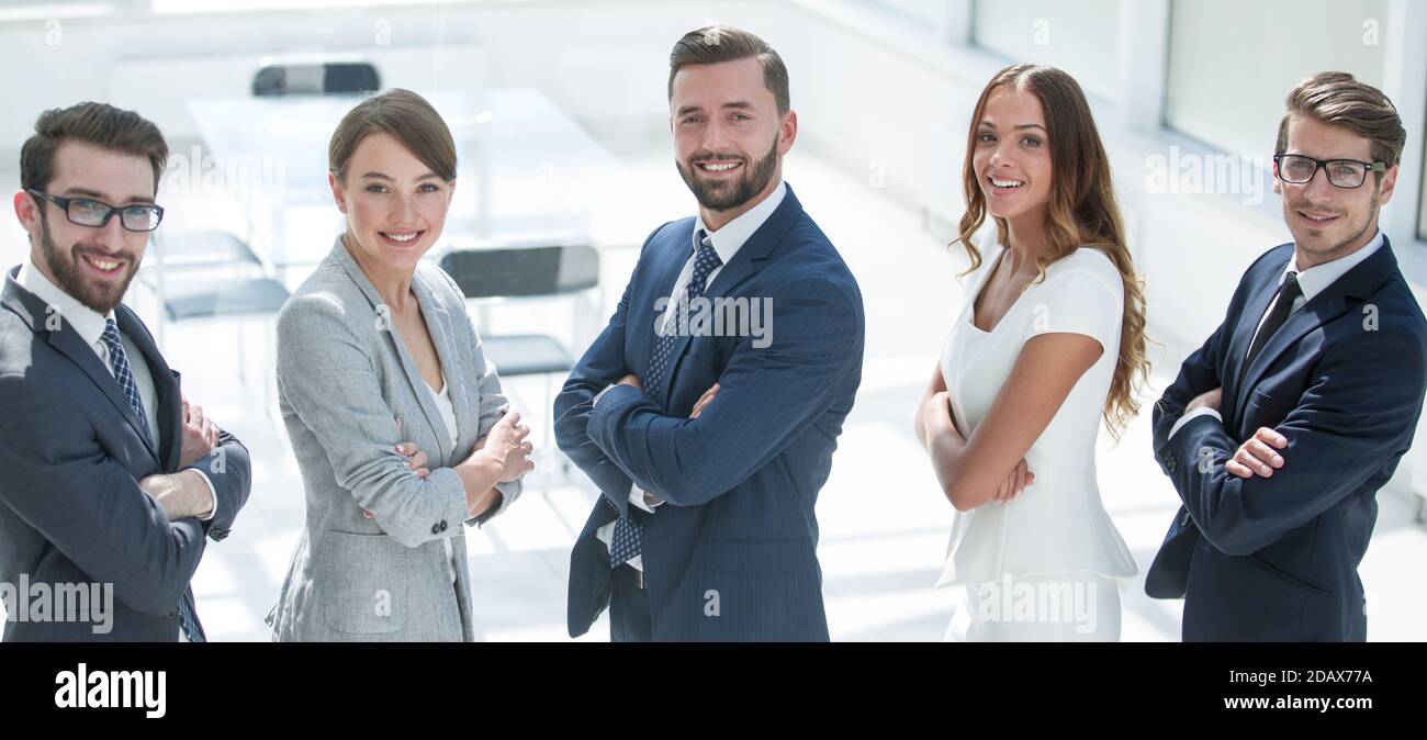 side view. successful business people standing together Stock Photo - Alamy