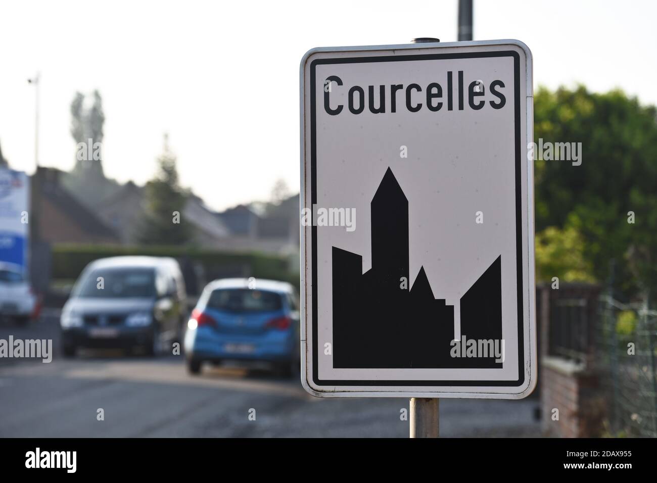 Illustration shows the name of the Courcelles municipality on a road sign, Tuesday 08 May 2018