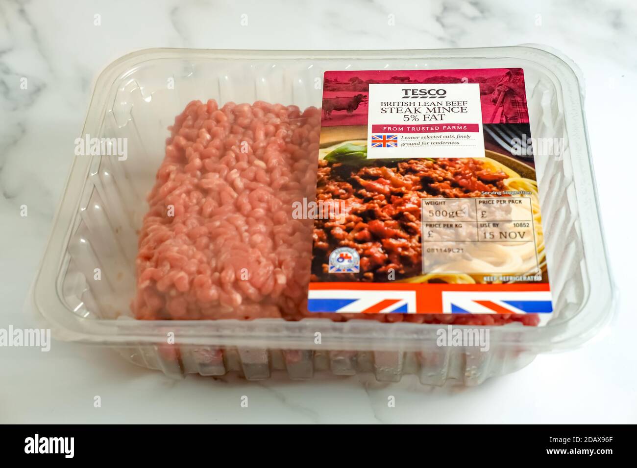 Norwich, Norfolk, UK – November 15 2020. Illustrative editorial photo of a plastic pack of Tesco 5% fat lean minced beef on a marbled white worktop Stock Photo