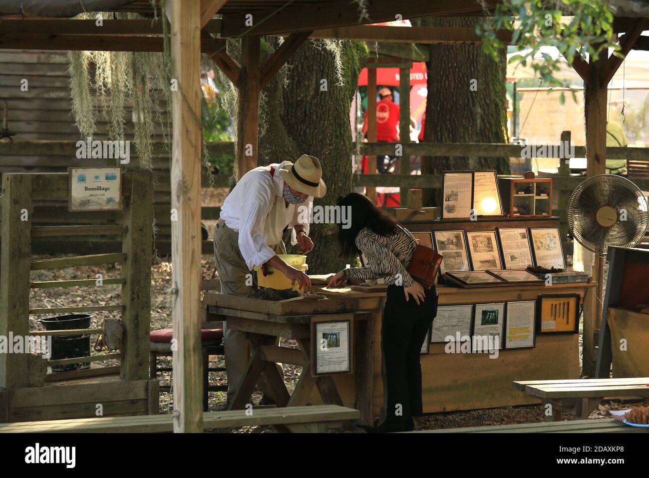 New Orleans, USA. 15th Nov, 2020. A visitor talks to a vendor during