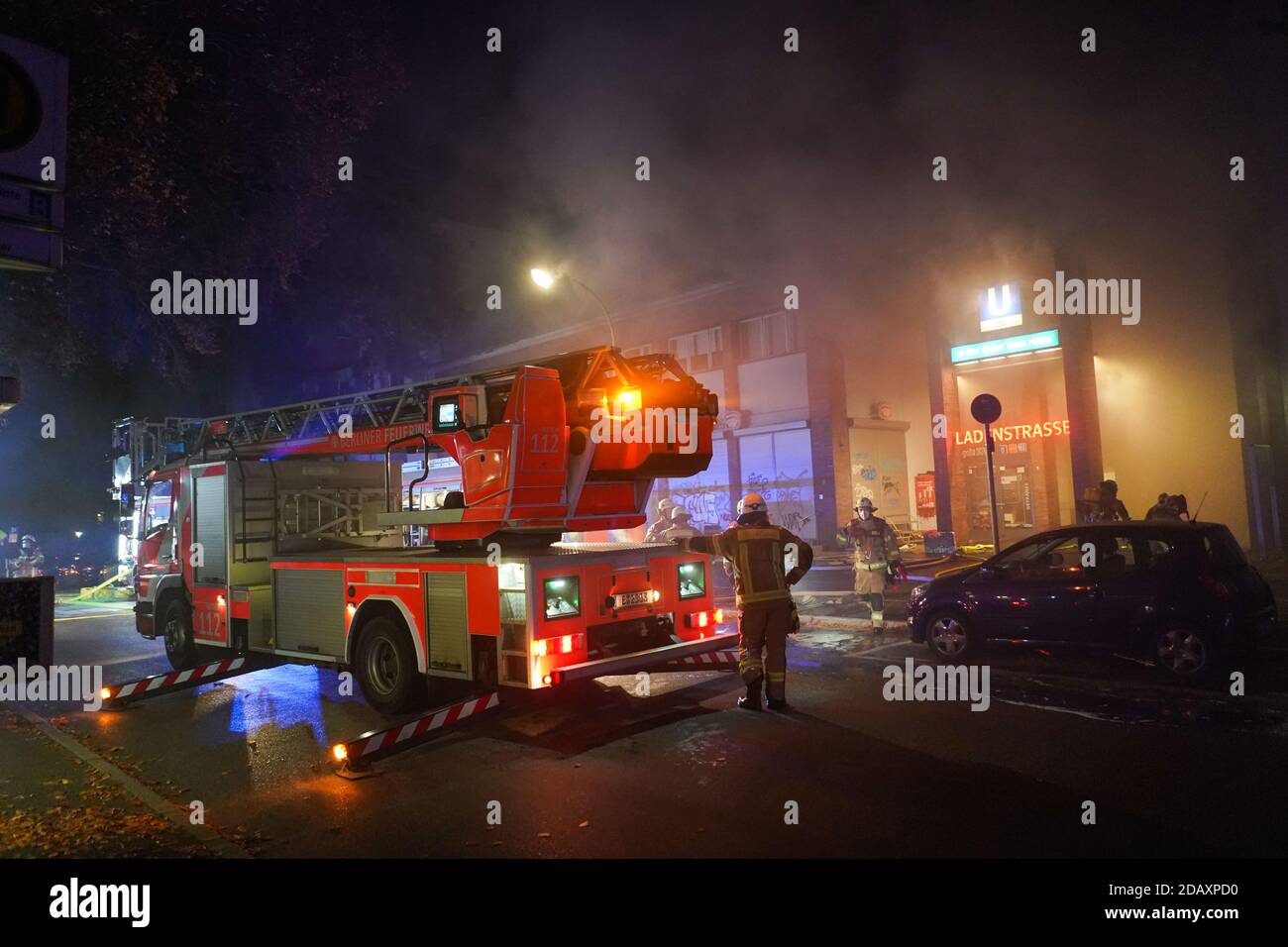 Berlin, Germany. 15th Nov, 2020. Firefighters extinguish a fire in the row of shops in the Uncle Tom's Hut subway station. Credit: Jörg Carstensen/dpa/Alamy Live News Stock Photo