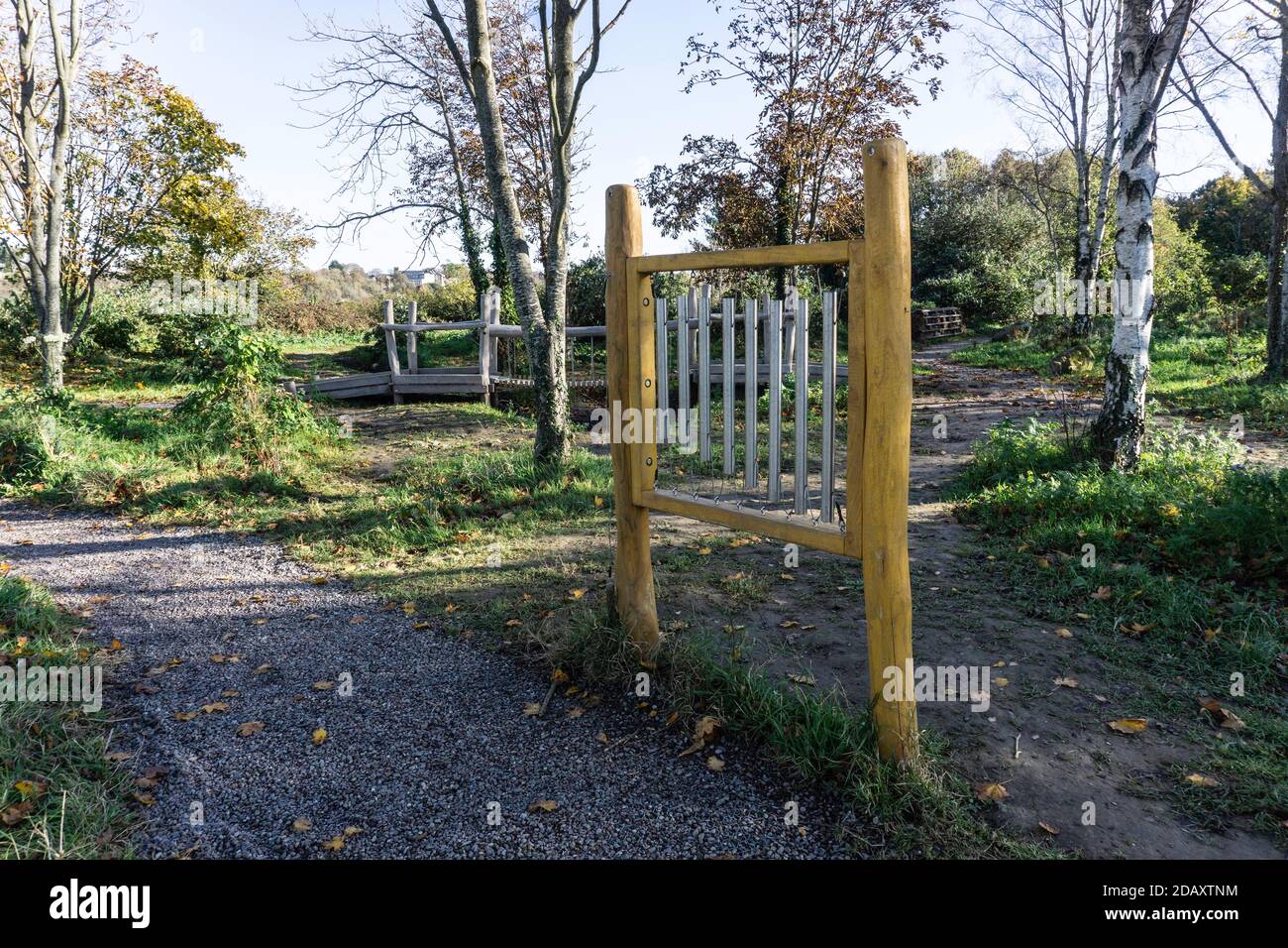 Outdoor musical chimes in Waterstown Park, in Palmerstown, Dublin, Ireland. Designed to encourage children’s musical ability, they appeal to all ages. Stock Photo