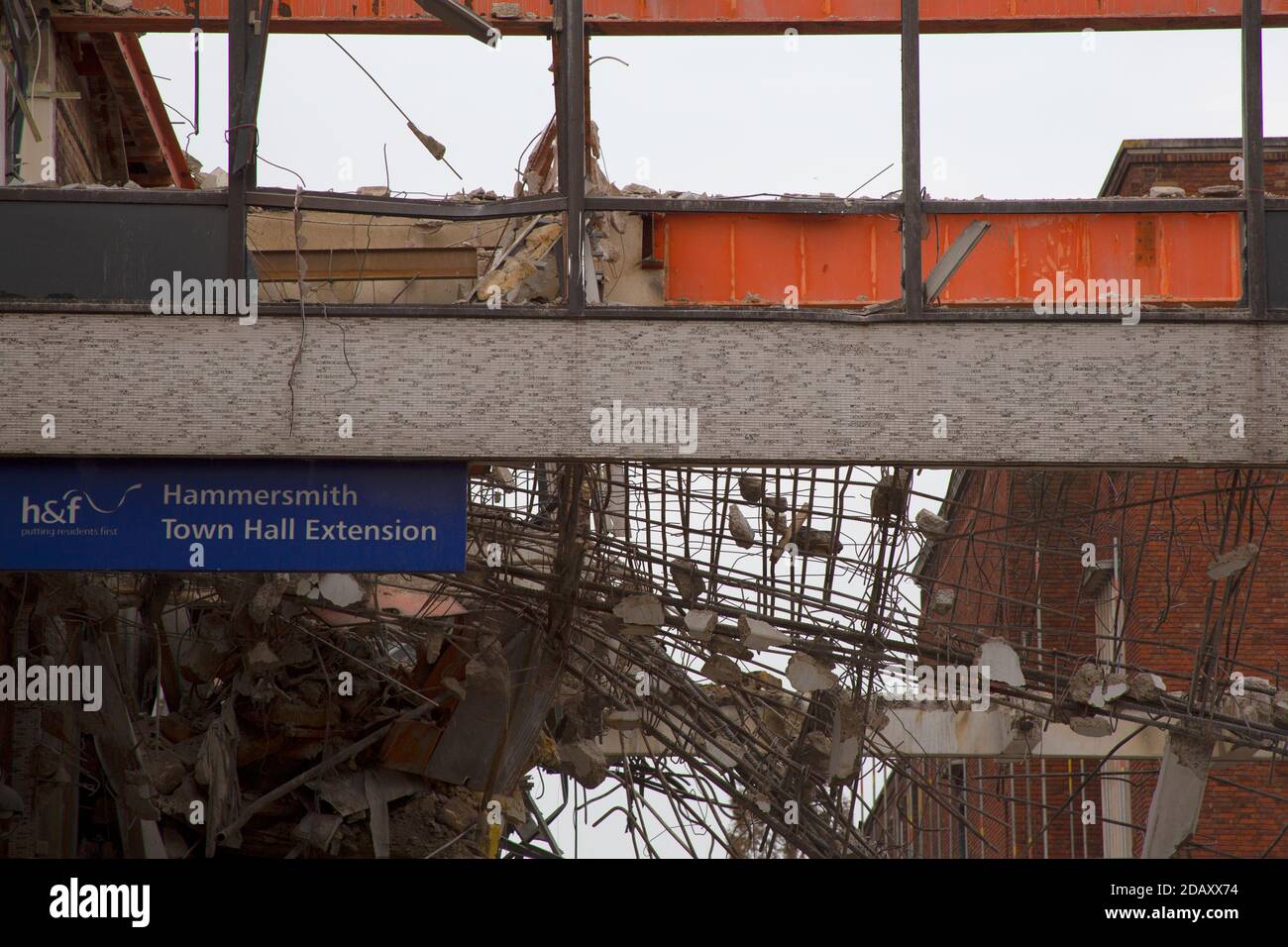 The demolition of Hammersmith Town Hall Annexe to redevelop into flats, Kings Street, Hammersmith West London UK Stock Photo