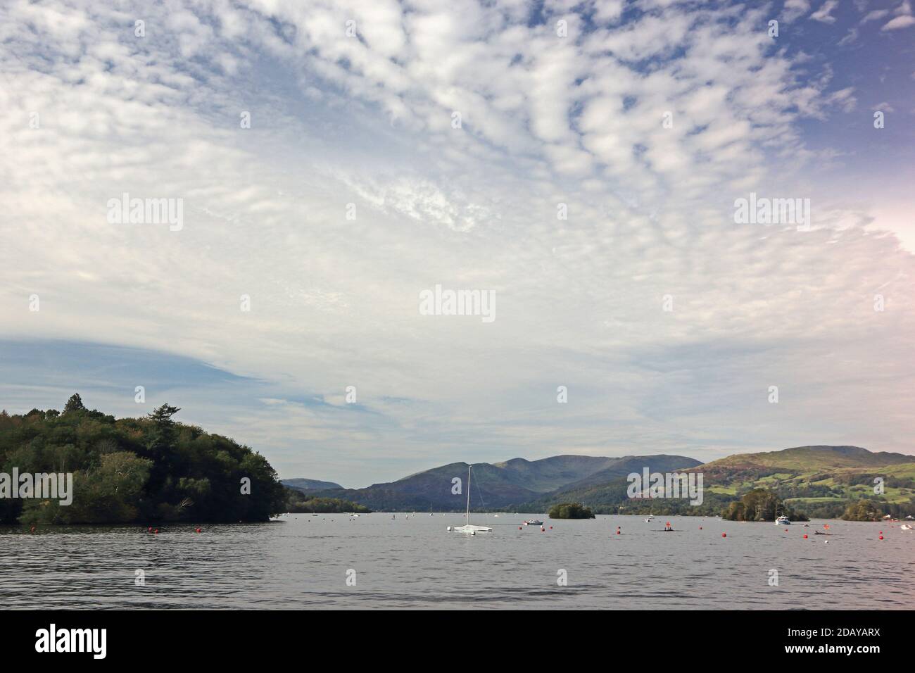 Lake Windermere, Belle Isle, Lady Holme and Hen Holme islands from Bowness shoreline Stock Photo