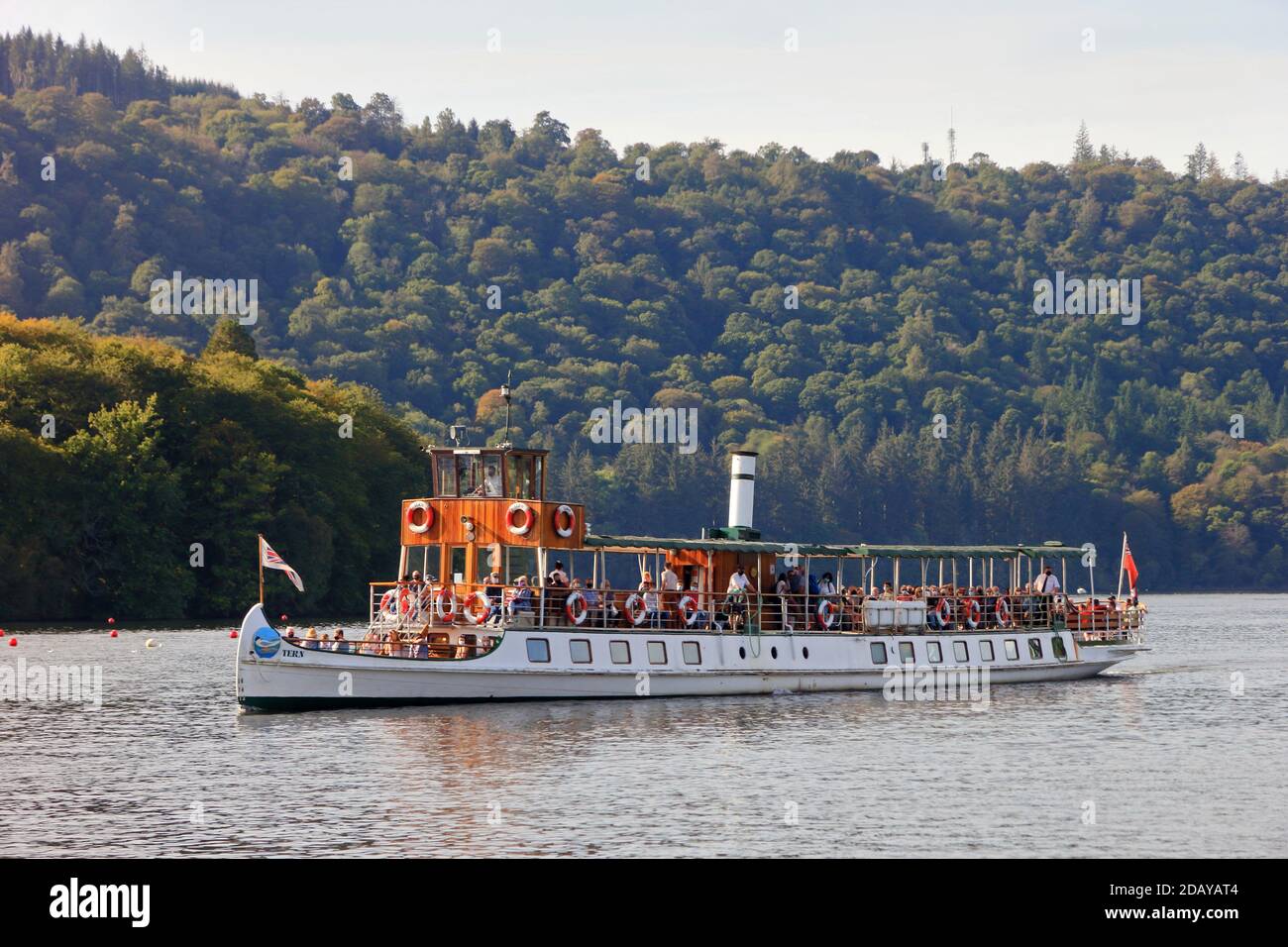 Passenger boat, Tern, crossing Lake Windermire on a bright autumn day Stock Photo