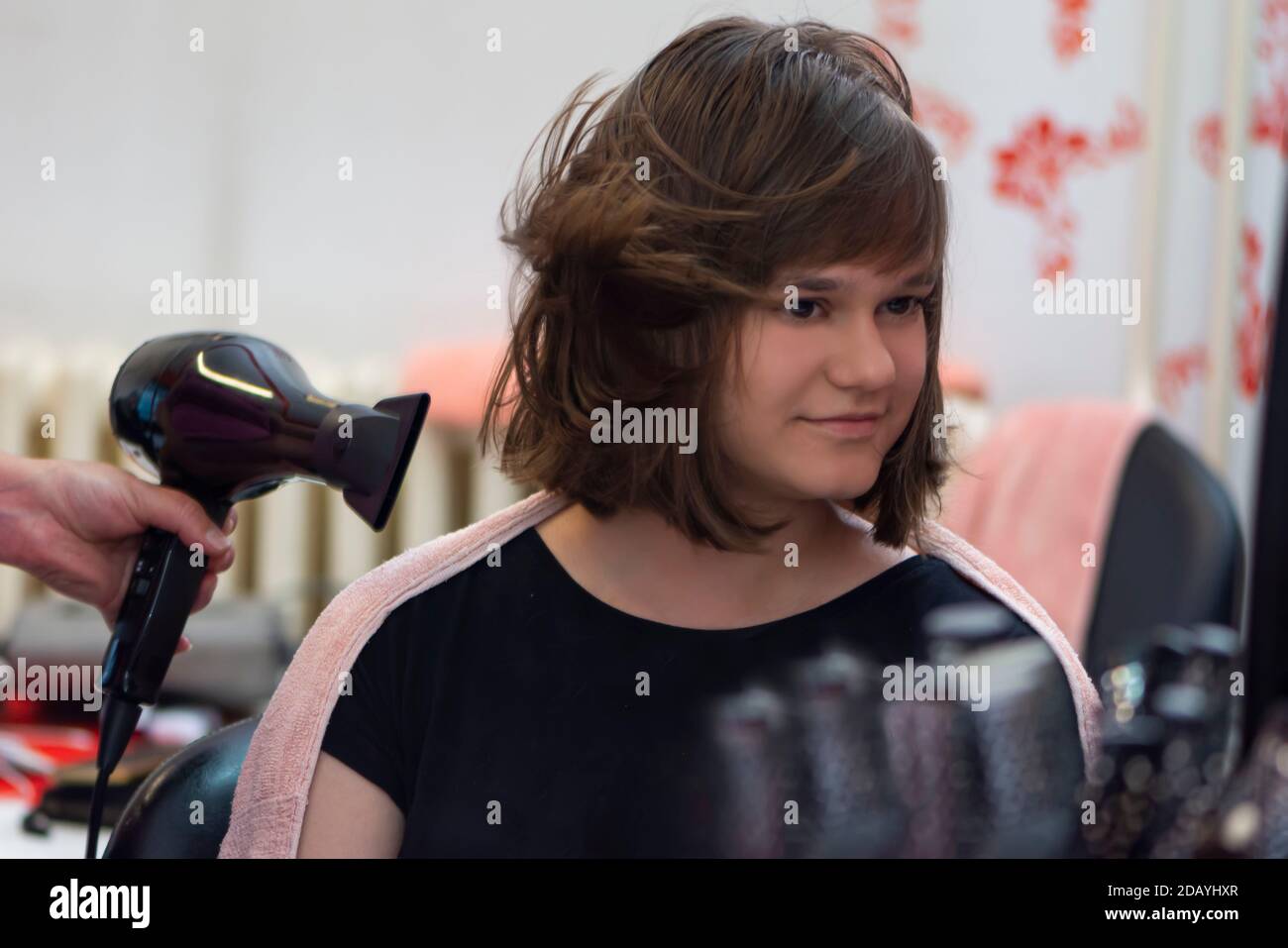 Portrait of young girl in hair salon Stock Photo - Alamy