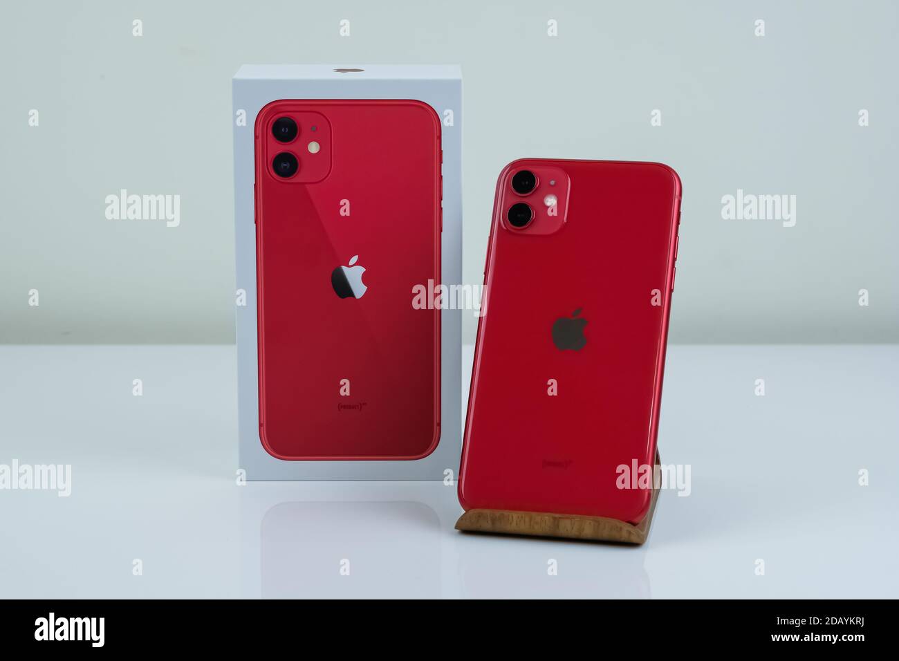 Iphone 11 In Red Next To Its Box Stock Photo Alamy