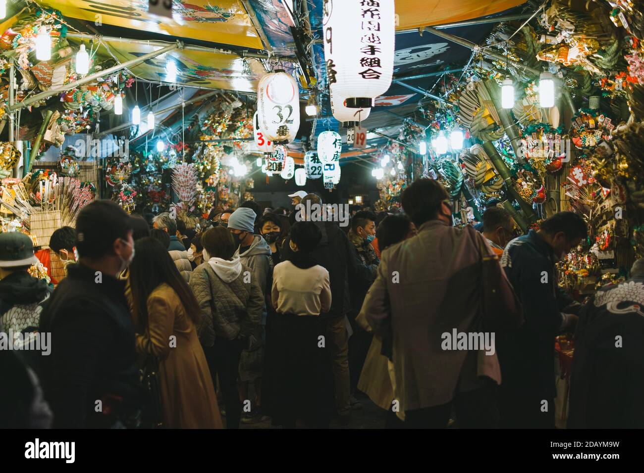 People Gather Inside Hanazono Shrine In Shinjuku Tokyo On November 14n To Celebrate Tori No Ichi People Come To The Festival To Buy Kumade A Talisman In The Shape Of A People Gather Inside Hanazono Shrine In Shinjuku Tokyo On November 14n To Celebrate Tori No Ichi People Come To The Festival To Buy Kumade A Talisman In The Shape Of A