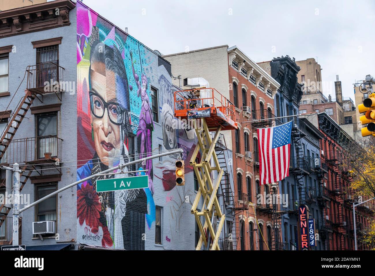 New York, United States. 15th Nov, 2020. ELLE street art working on mural Notorious RBG sponsored by The LISA Project NYC on 11th street in Lower East Side in New York on November 15, 2020. (Photo by Lev Radin/Sipa USA) Credit: Sipa USA/Alamy Live News Stock Photo