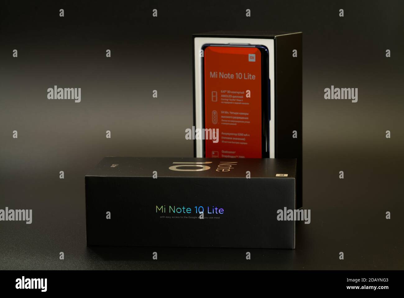 Xiaomi mi note 10 lite new phone box, on dark background Stock Photo