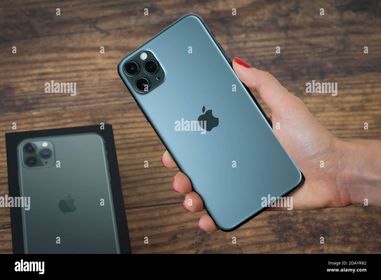 Iphone 11 Pro Max In Midnight Green Color Next To Its Box Stock Photo Alamy