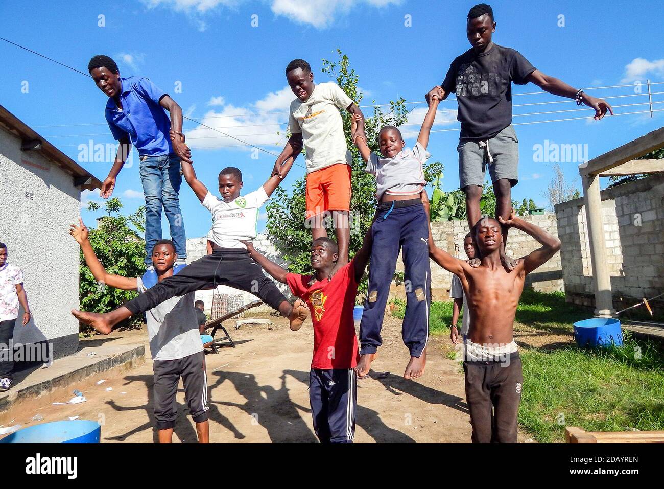 Circus Zambia performers practice acrobatics before a community show in Lusaka. Stock Photo