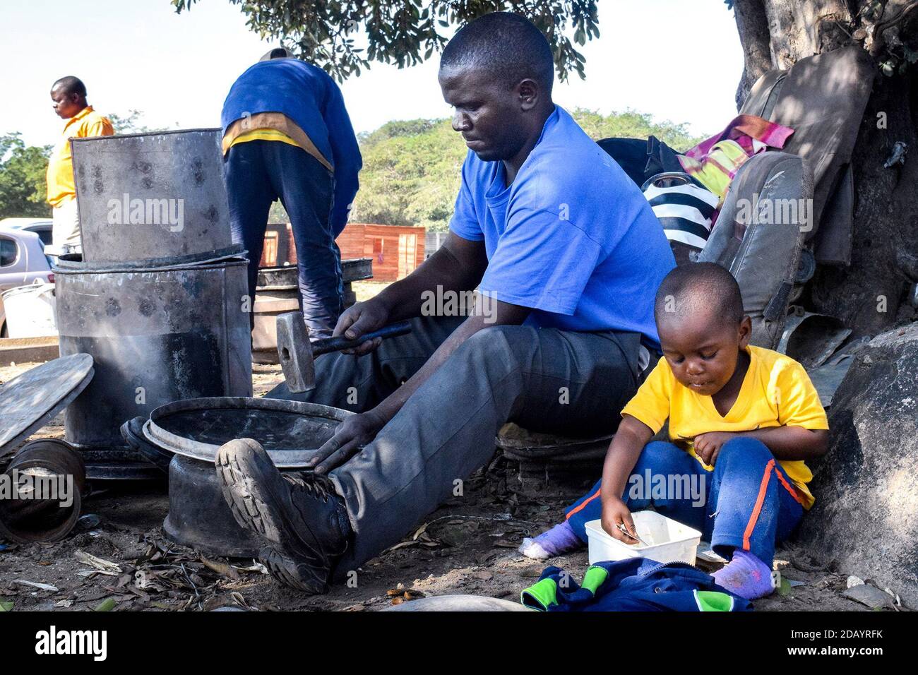 In Harare, Zimbabwe, Paul Murombo, 33, makes cooking pots from aluminum
