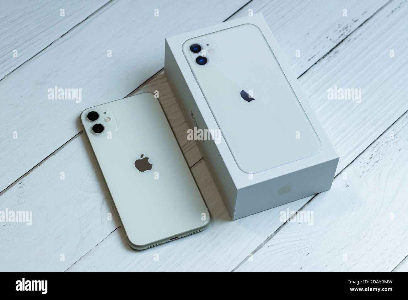 iPhone 11 in white next to its box Stock Photo - Alamy