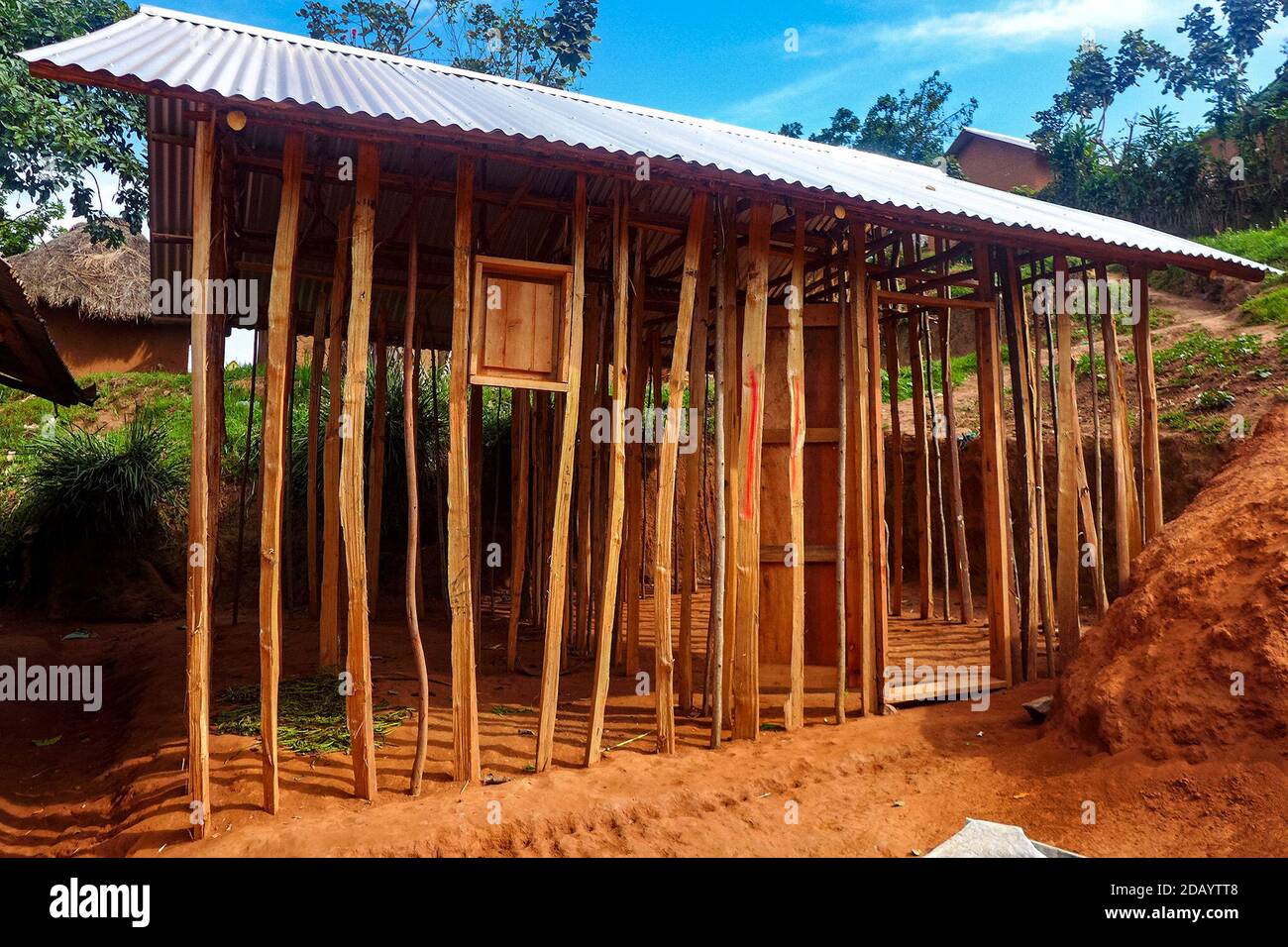 A wooden house is being constructed in Kirumba, Democratic Republic of