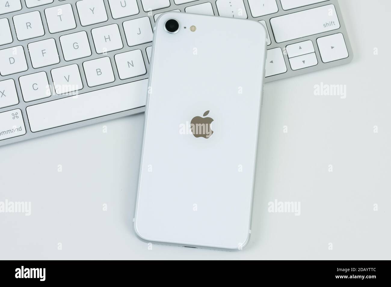 iPhone SE 2 (2nd generation) in white color. Stock Photo