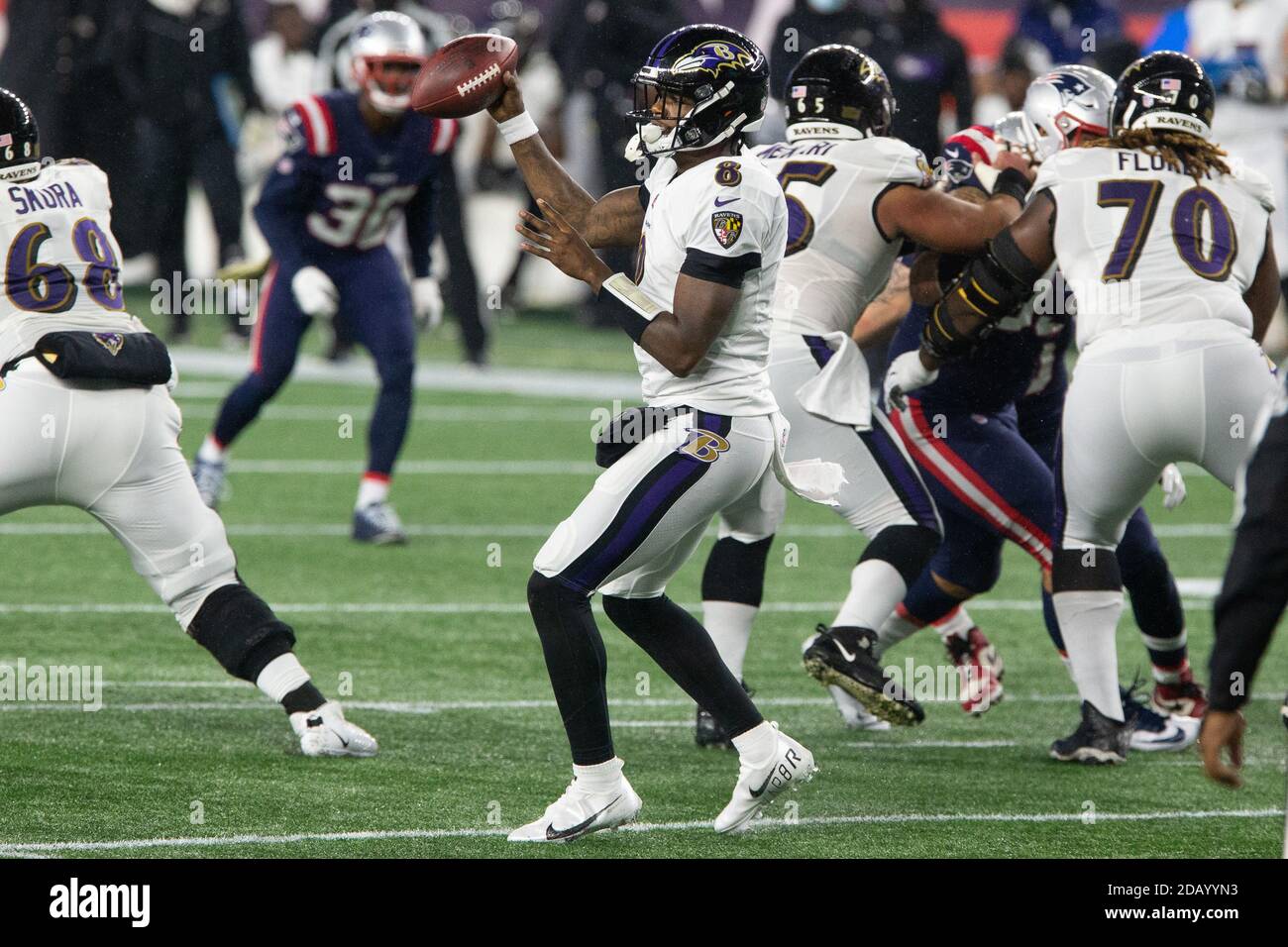 Foxborough, United States. 15th Nov, 2020. Baltimore Ravens quarterback Lamar Jackson (8) fakes a pass in the second quarter against the New England Patriots at Gillette Stadium in Foxborough, Massachusetts on Sunday, November 15, 2020. Photo by Matthew Healey/UPI Credit: UPI/Alamy Live News Stock Photo