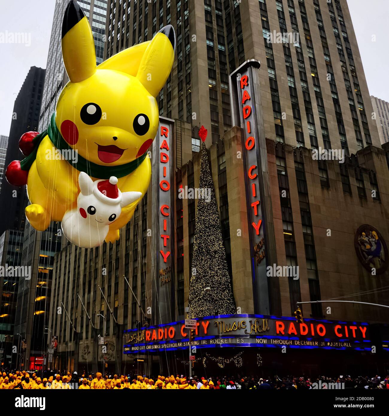 Pikachu pokemon balloon floats in the air during the Macy's Thanksgiving  Day parade along Avenue of Americas with Radio Music Hall in the background  Stock Photo - Alamy