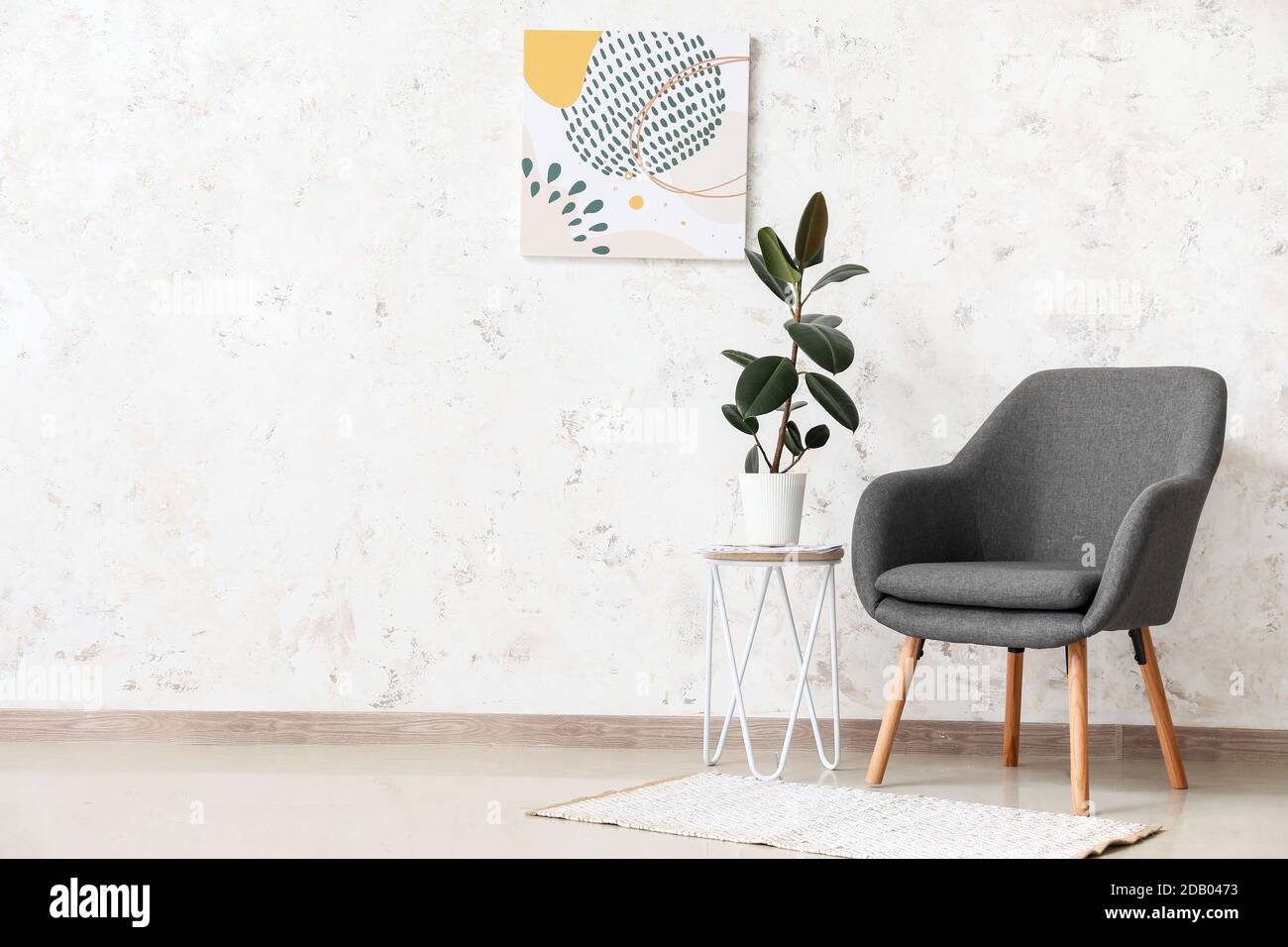 Interior of light modern living room with table and armchair Stock ...