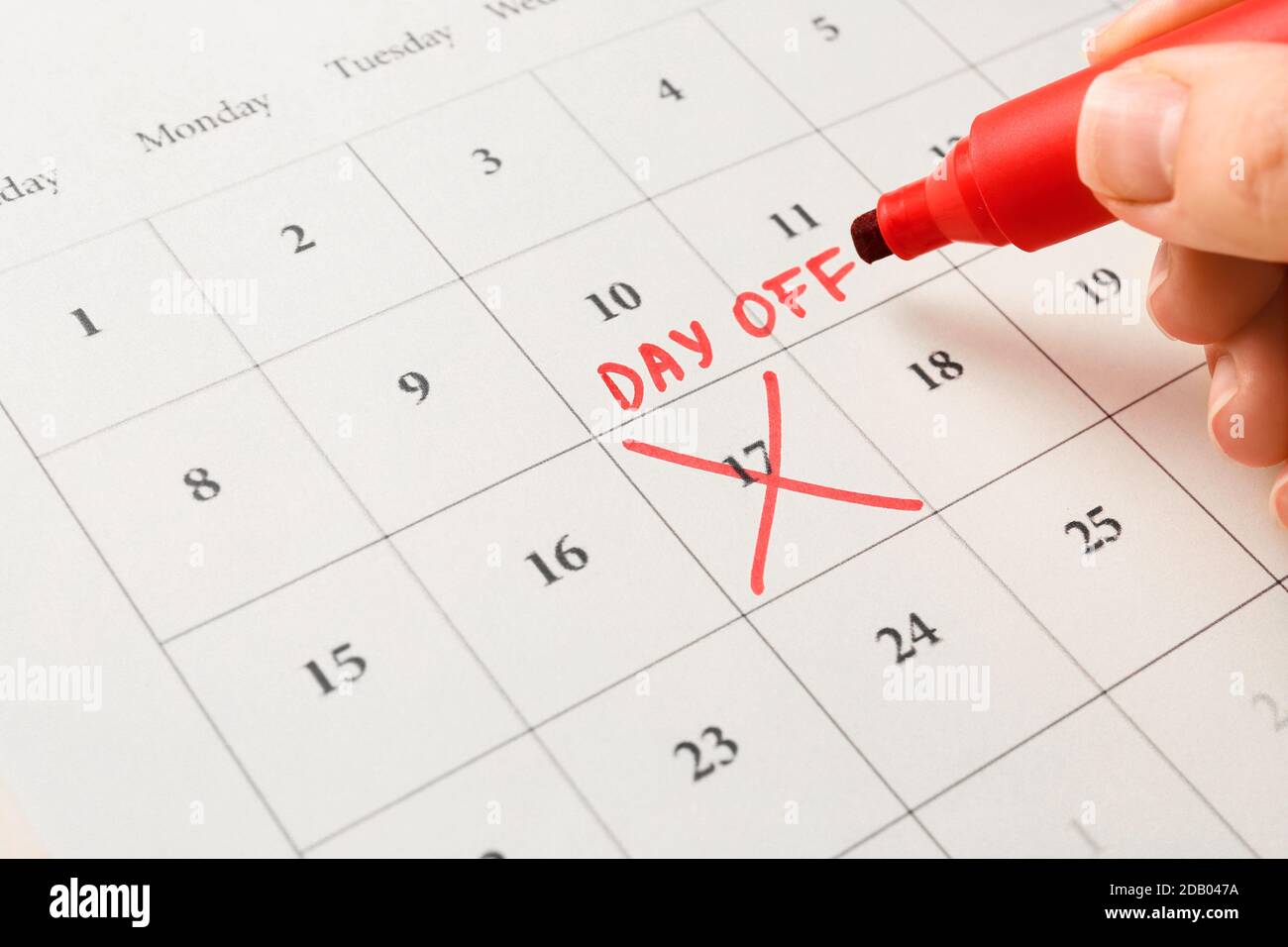 Woman marking day off in calendar, closeup Stock Photo Alamy