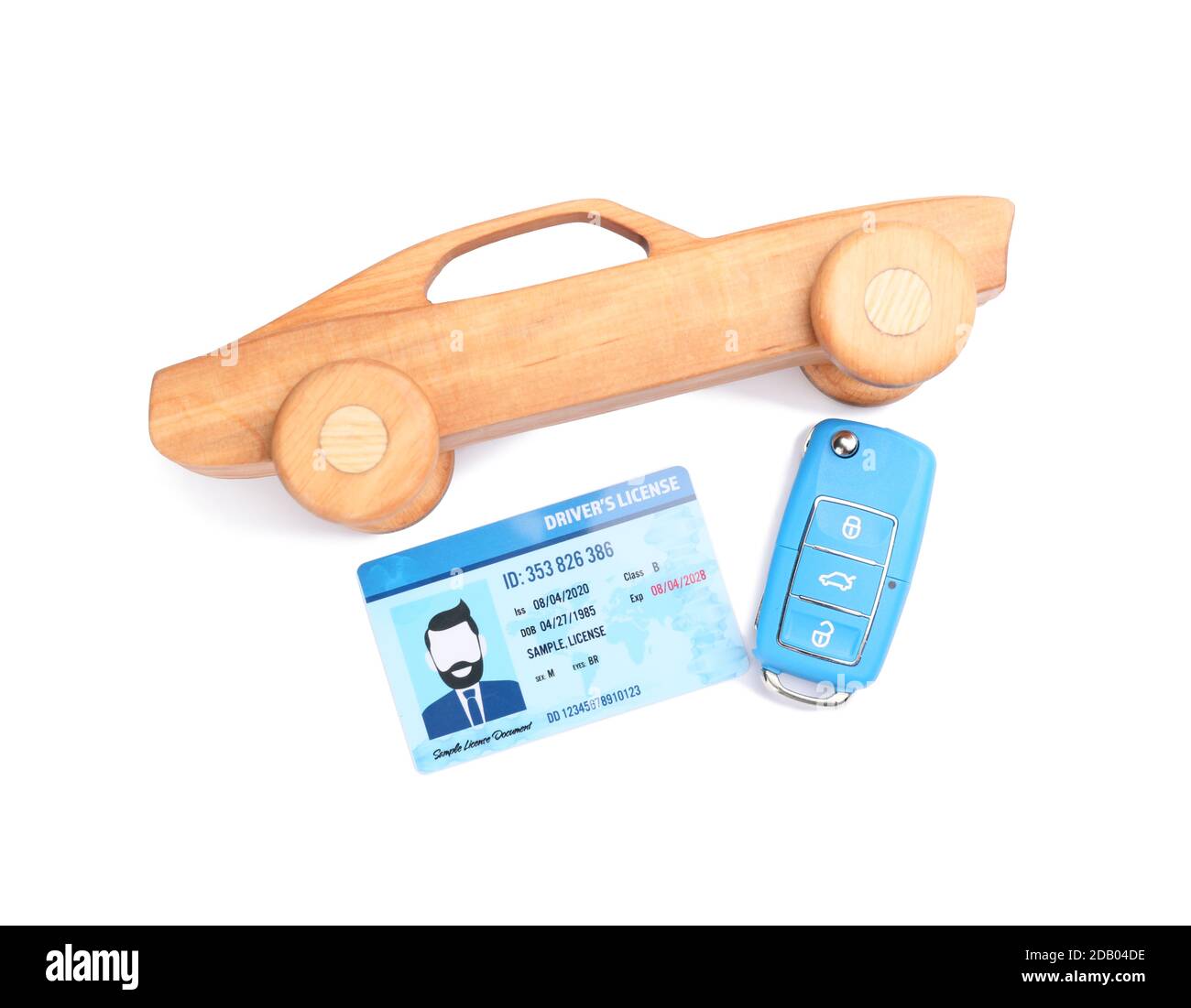 Driving license with car and key on white background Stock Photo