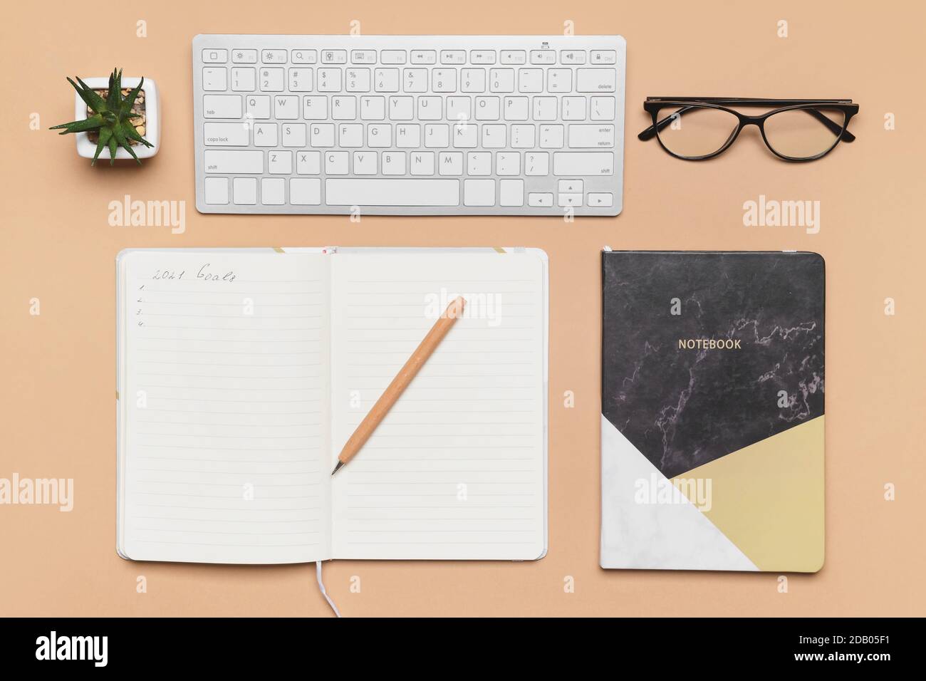 To Do List Mini Computer Empty to do list with computer keyboard on color background Stock Photo ...