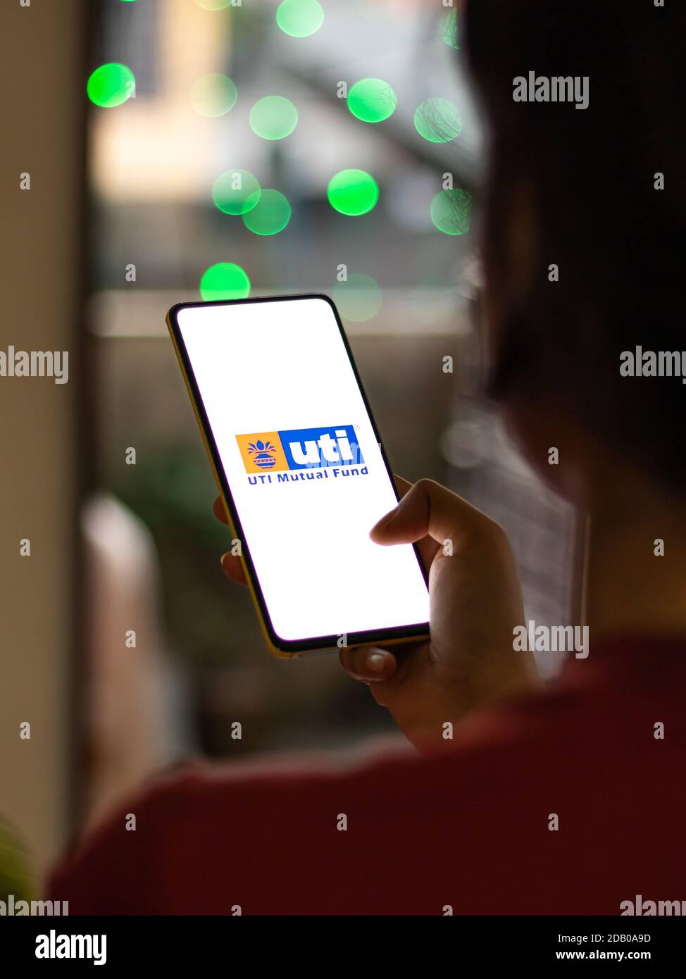 Assam, india - November 15, 2020 : UTI logo on phone screen stock image. Stock Photo