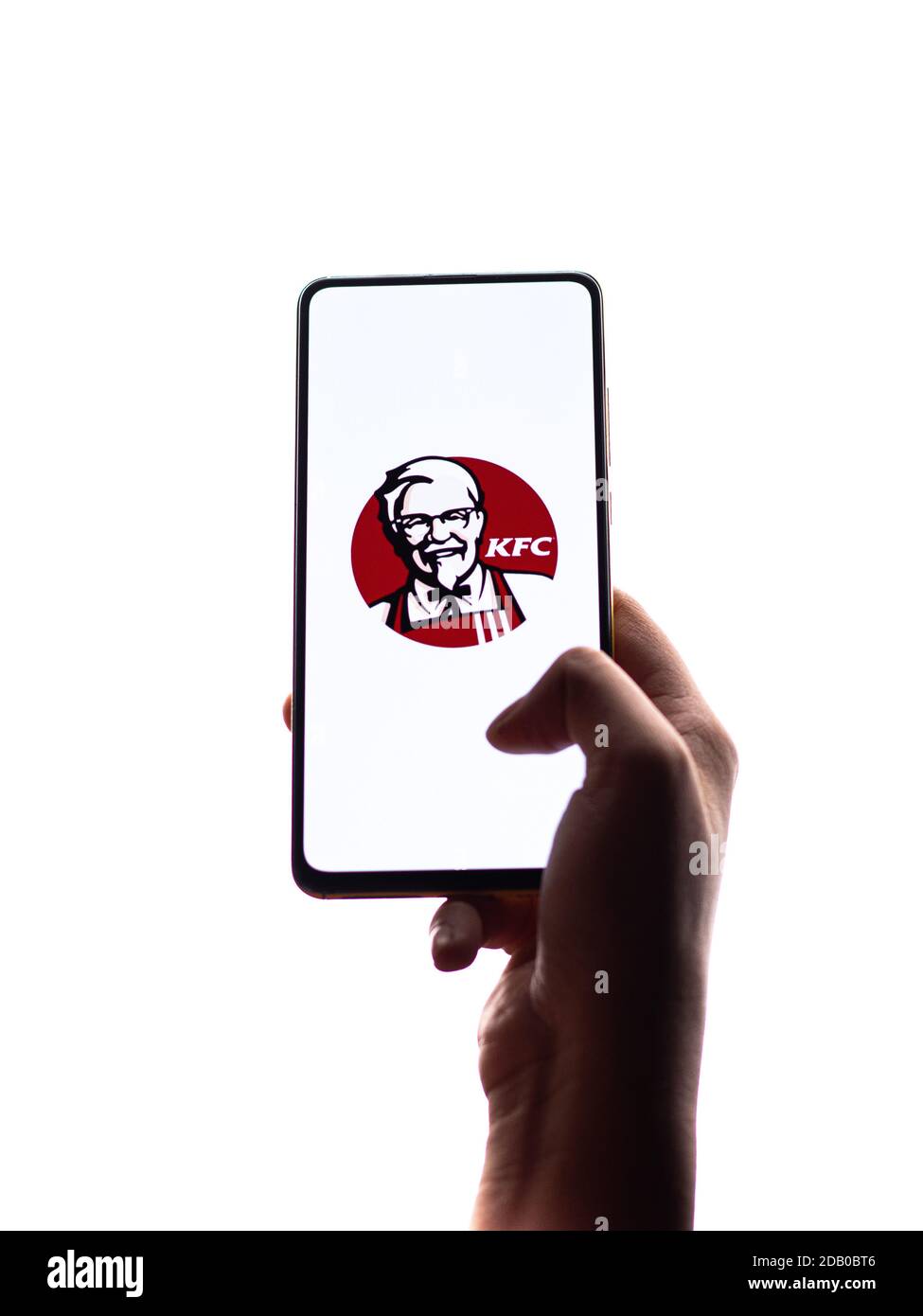 Assam, india - November 15, 2020 : KFC logo on phone screen stock image. Stock Photo