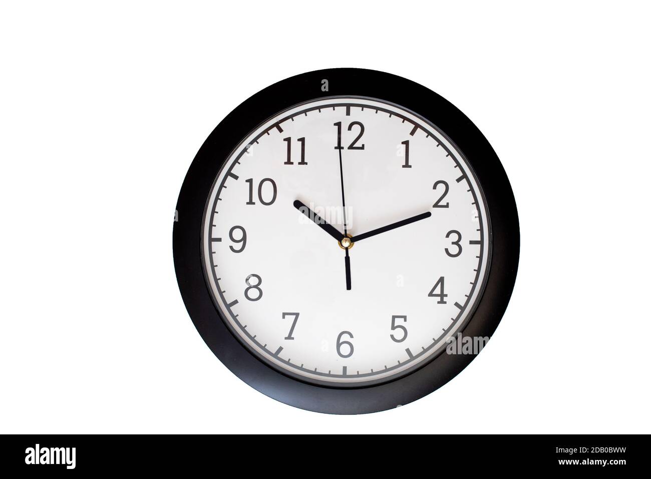 Classic analog clock white dial indicating ten minutes past eleven isolated on white background, front view, close-up. Stock Photo