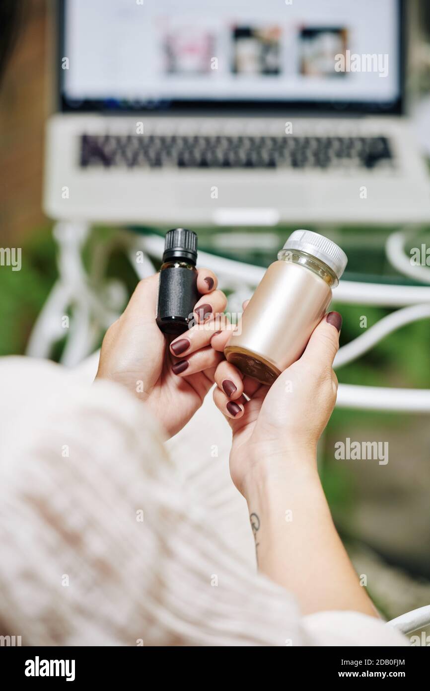 Woman ordered cosmetics online Stock Photo