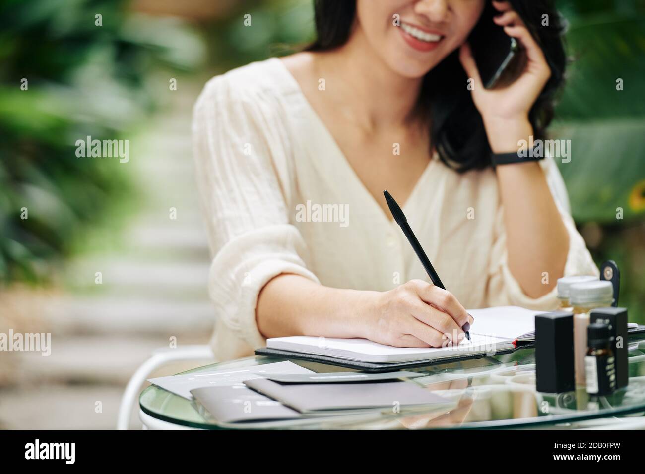 Business lady talking on phone Stock Photo
