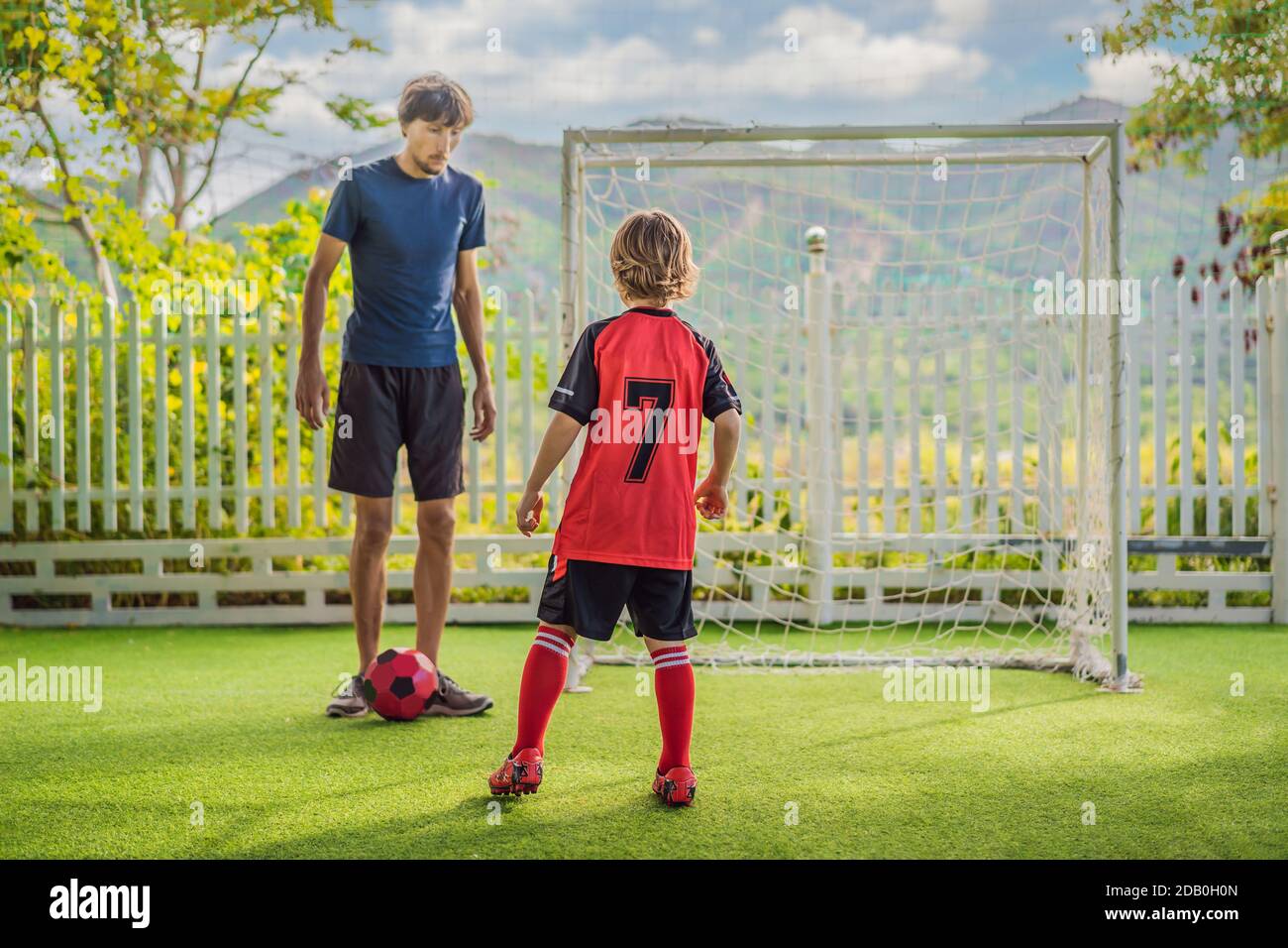 Boy red football jersey hi-res stock photography and images - Alamy