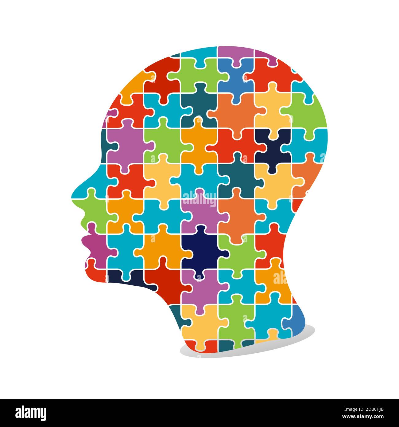 Silhouette of female head with multicolored puzzle pieces. Education