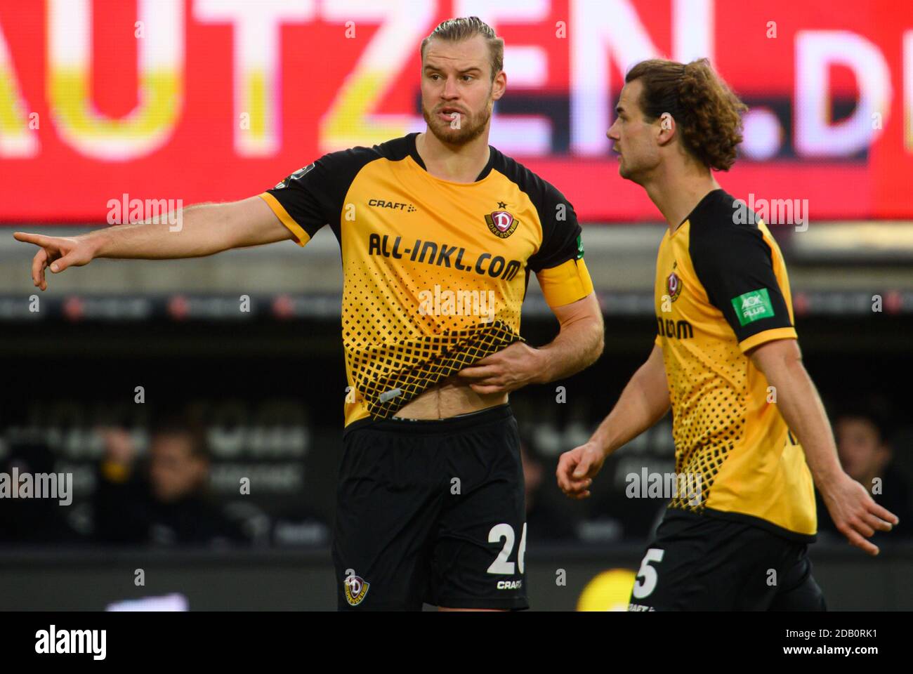 Dresden, Germany. 23rd July, 2022. Soccer: 3rd league, SG Dynamo Dresden - TSV  1860 Munich, Matchday 1, Rudolf Harbig Stadium. Dynamo's Kevin Ehlers  (l-r), Tim Knipping and Dennis Borkowski emotional. Credit: Robert