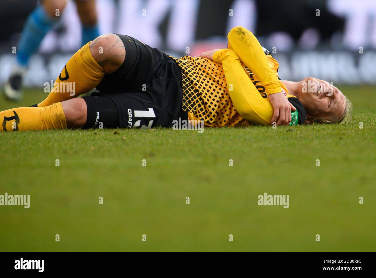 Dresden, Germany. 23rd July, 2022. Soccer: 3rd league, SG Dynamo Dresden - TSV  1860 Munich, Matchday 1, Rudolf Harbig Stadium. Dynamo's Kevin Ehlers  (l-r), Tim Knipping and Dennis Borkowski emotional. Credit: Robert