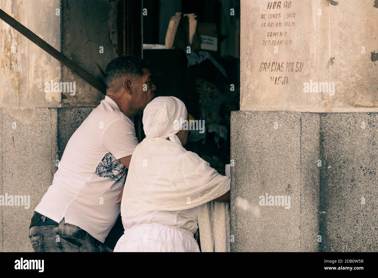 Man and woman waiting for a coffee in central Havana. Street coffee shop. Stock Photo