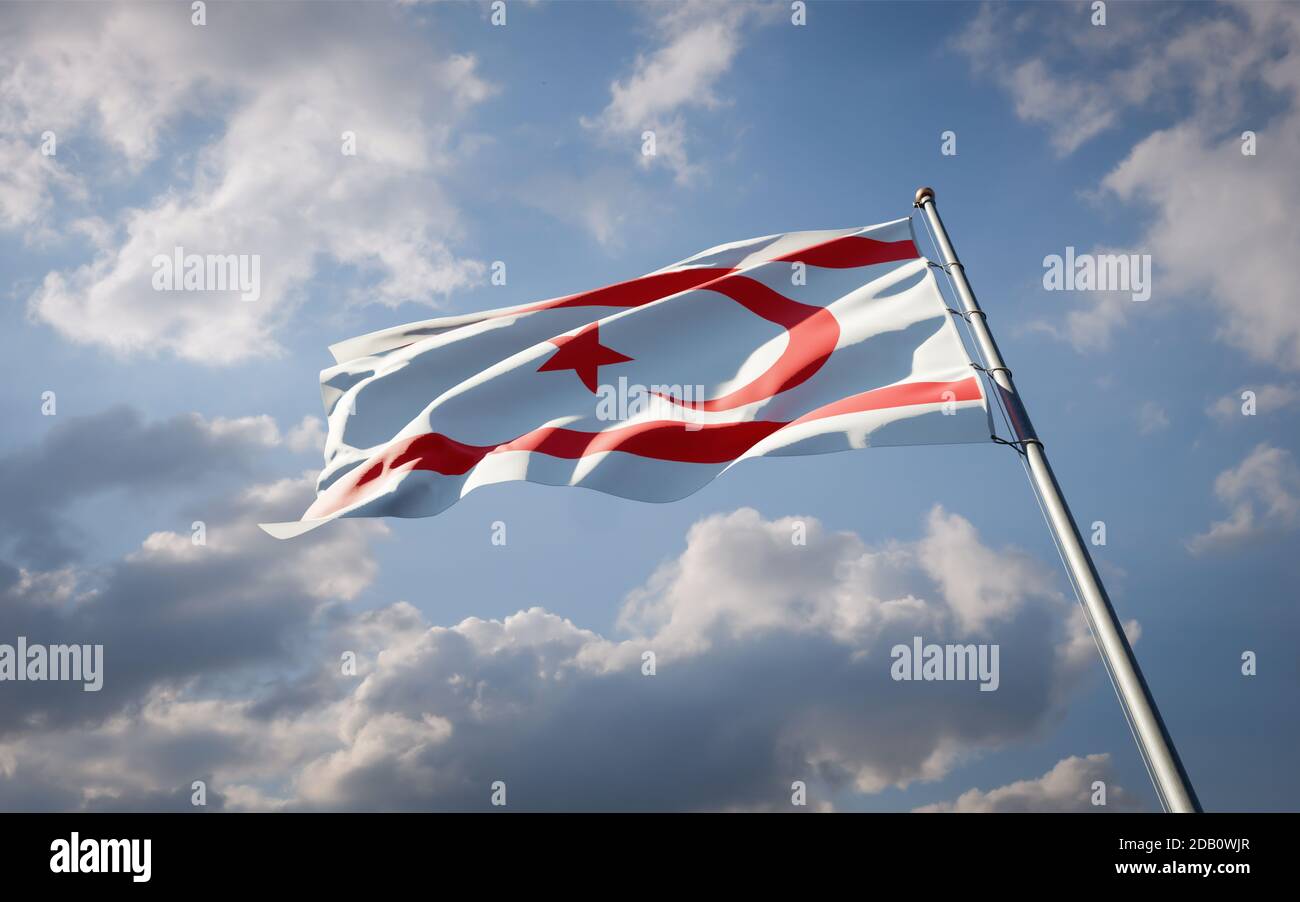 Beautiful national state flag of Northern Cyprus fluttering at sky background. Low angle close-up Northern Cyprus flag 3D artwork. Stock Photo