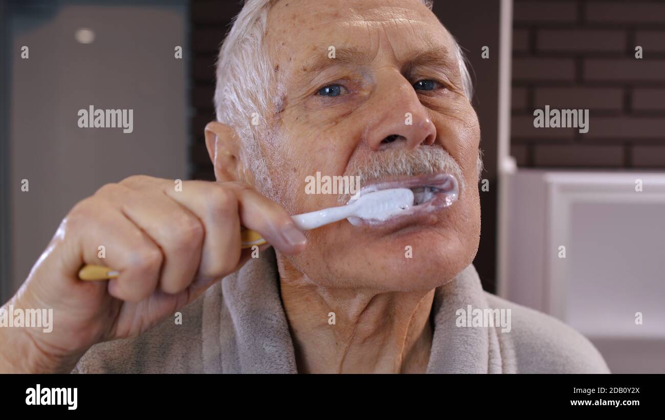 Elderly man bathrobe hires stock photography and images Alamy