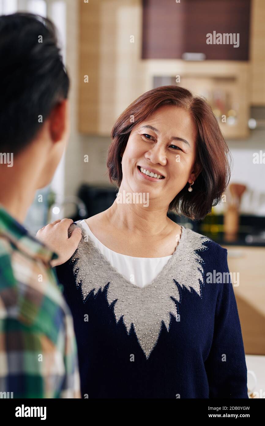 Mother looking at son Stock Photo