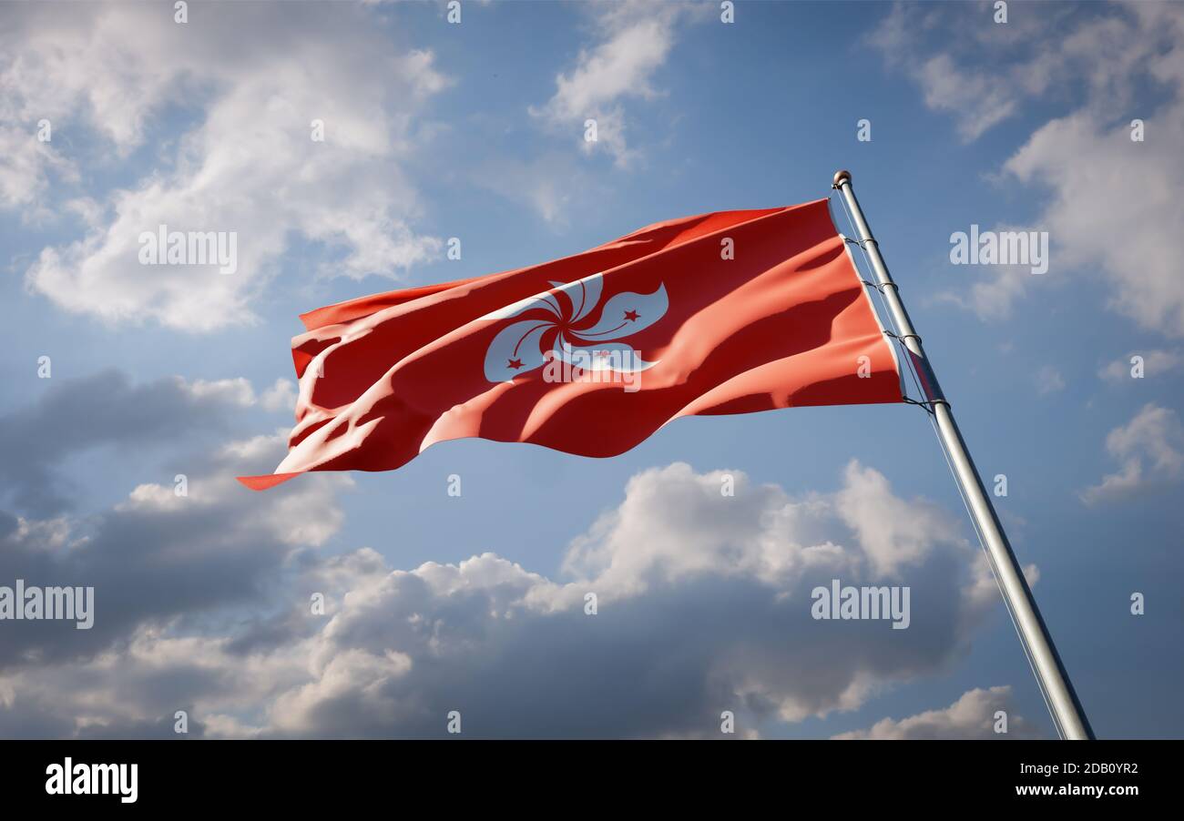 Beautiful national state flag of Hong Kong fluttering at sky background. Low angle close-up Hong Kong flag 3D artwork. Stock Photo