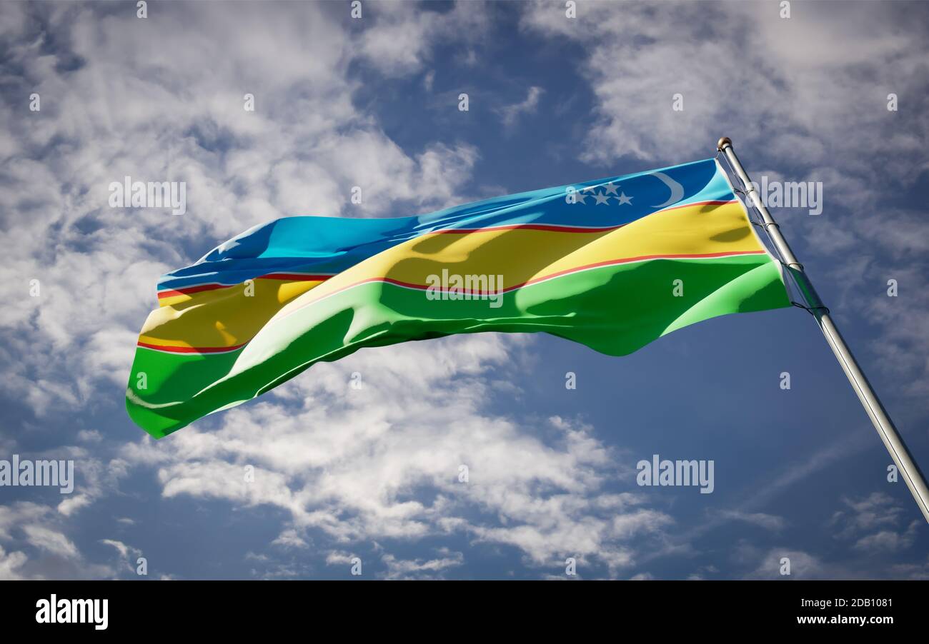 Beautiful national state flag of Karakalpakstan fluttering at sky ...