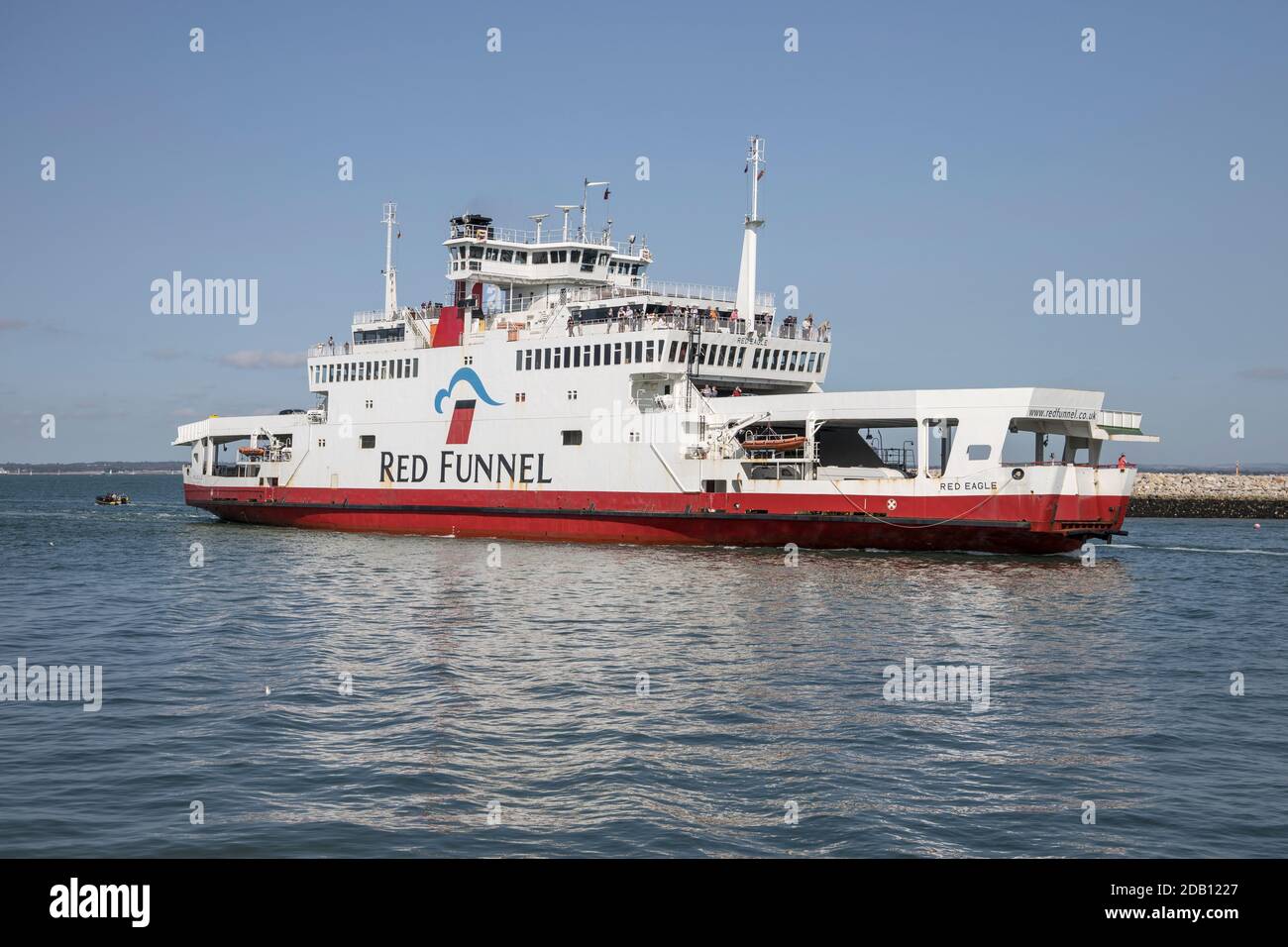 Red Funnel Ferry Leaving The Harbour At Cowes On The Isle Of Wight red-funnel-ferry-leaving-the-harbour-at-cowes-on-the-isle-of-wight