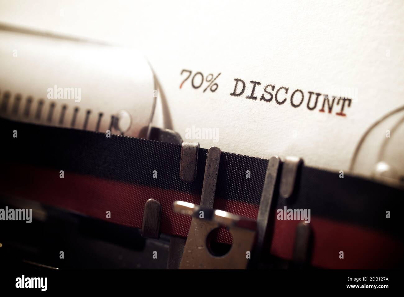 70 % discount text written on a paper. Stock Photo