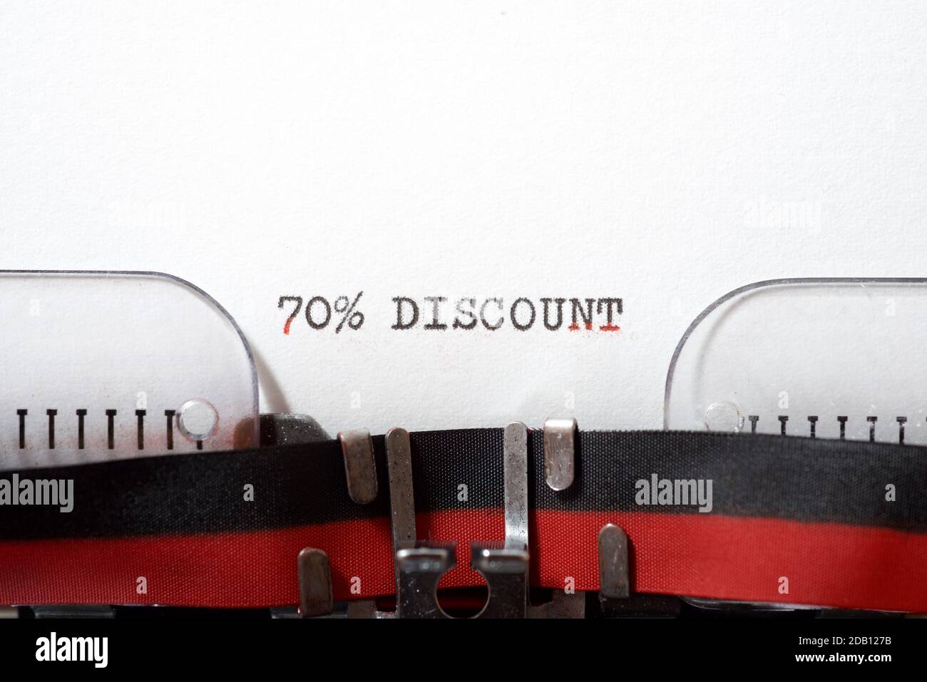 70 % discount text written on a paper. Stock Photo