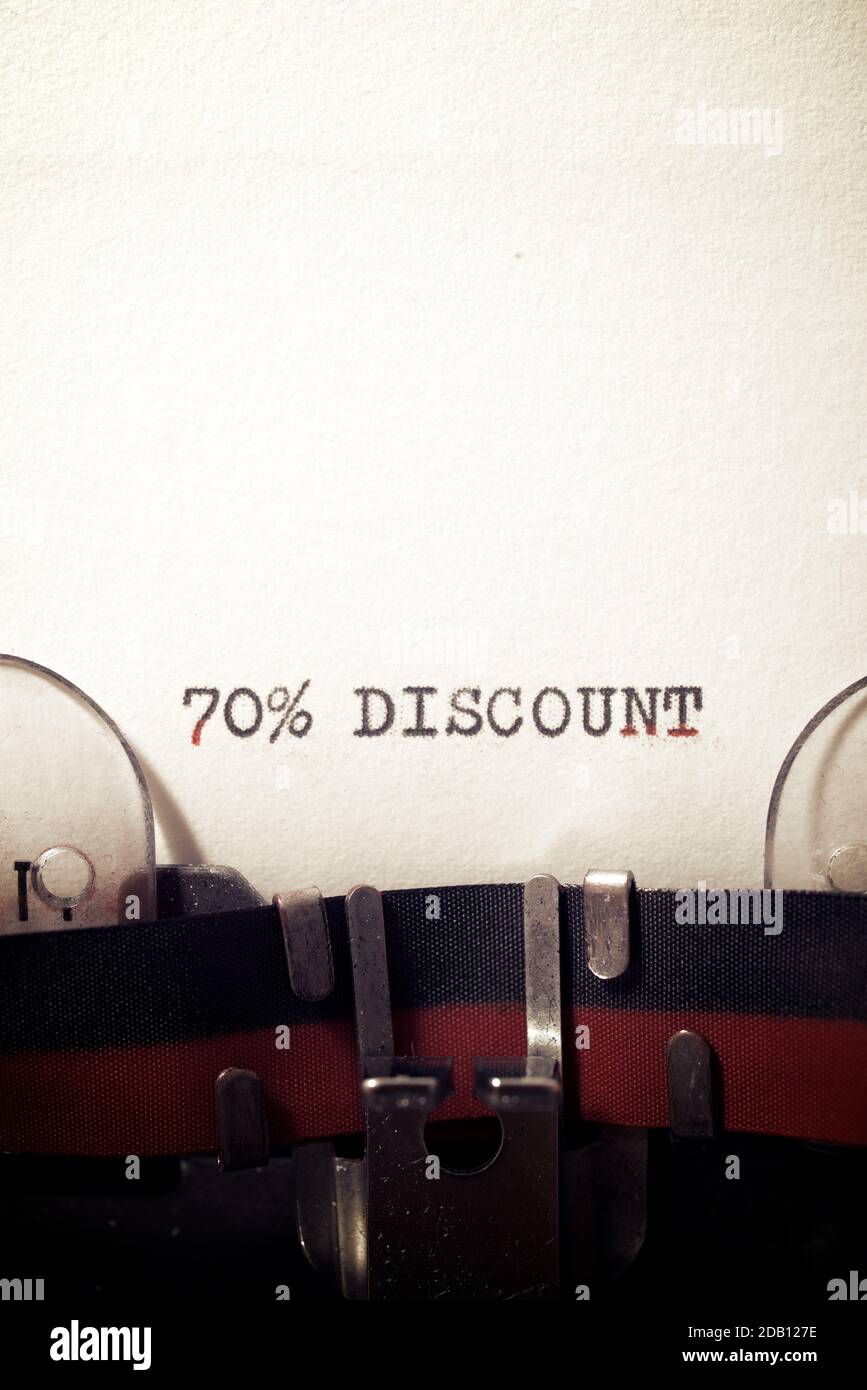 70 % discount text written on a paper. Stock Photo