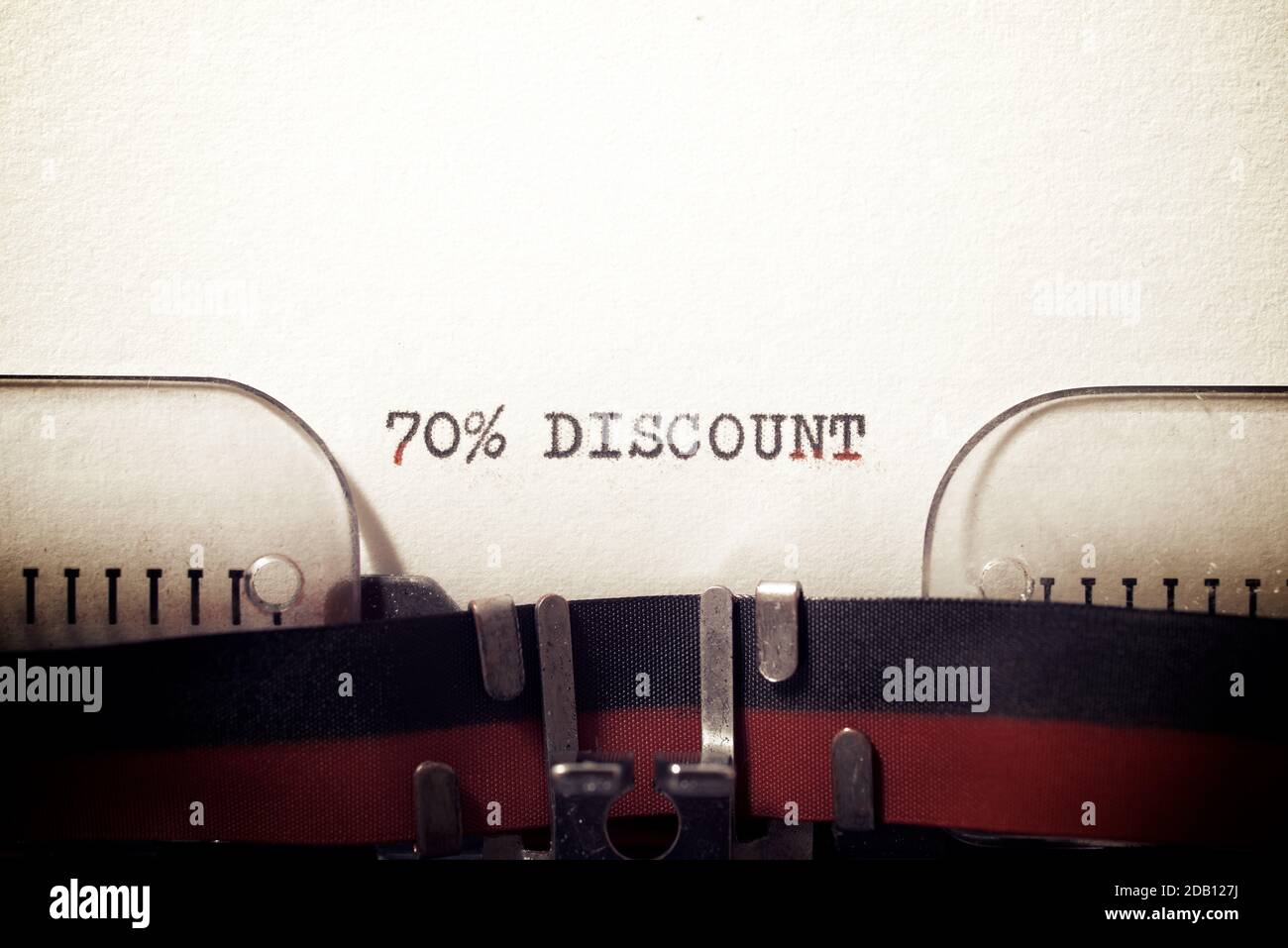70 % discount text written on a paper. Stock Photo